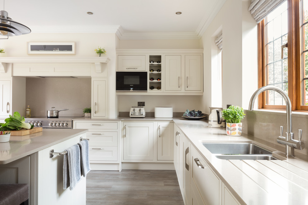This is an example of a transitional kitchen in West Midlands.