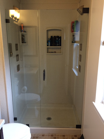 Transitional 3/4 beige tile and ceramic tile ceramic tile and beige floor alcove shower photo with beige walls and a hinged shower door