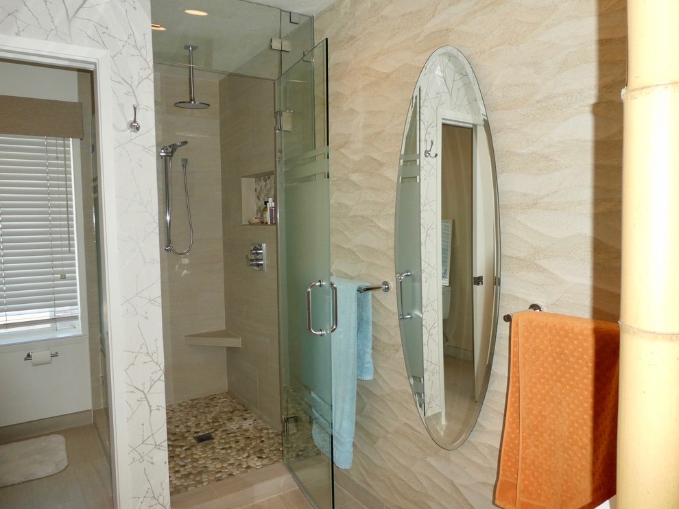 Mid-sized transitional master porcelain tile and beige floor alcove shower photo with flat-panel cabinets, beige cabinets, beige walls, a vessel sink, quartzite countertops, a hinged shower door and beige countertops