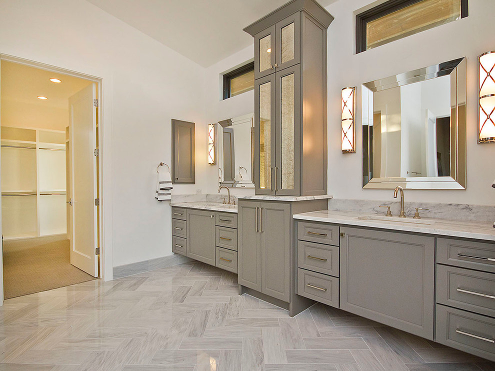 Inspiration for an expansive contemporary master bathroom in Austin with an undermount sink, shaker cabinets, grey cabinets, marble benchtops, a freestanding tub, a double shower, a two-piece toilet, gray tile, stone tile, grey walls, marble floors and grey floor.