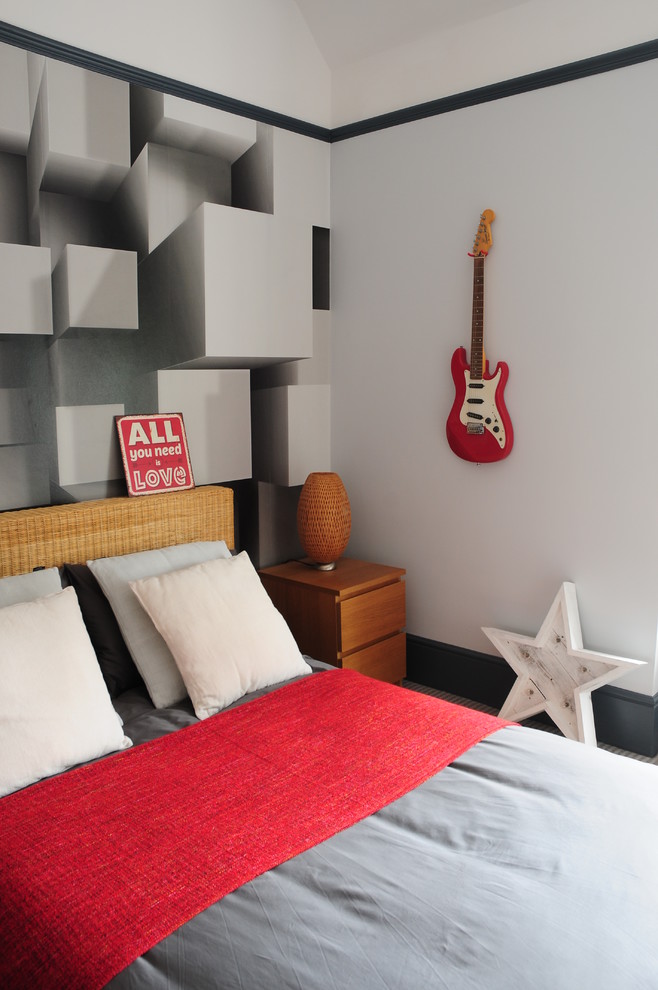 Design ideas for a contemporary teen room for boys in London with white walls.