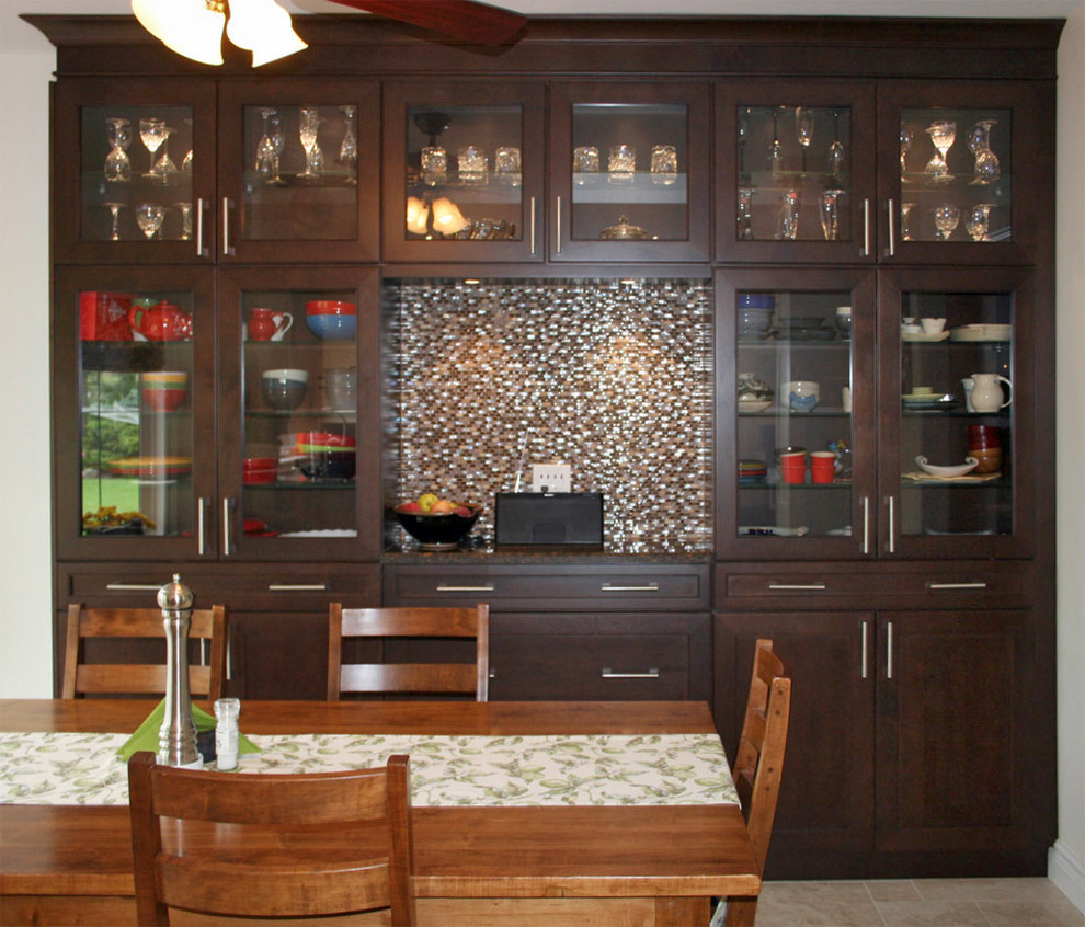 Example of a mid-sized transitional single-wall porcelain tile eat-in kitchen design in Toronto with shaker cabinets, dark wood cabinets, quartz countertops, multicolored backsplash, mosaic tile backsplash and no island