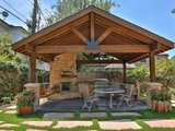 Rustic Patio by Remodelers of Houston