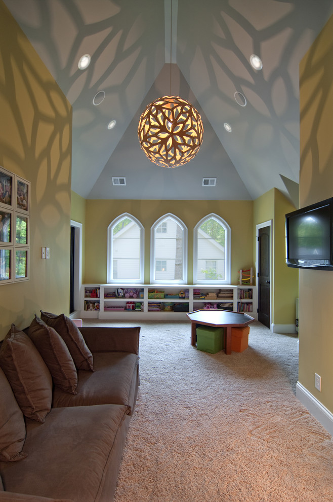 Large eclectic gender-neutral kids' room in Charlotte with yellow walls, carpet and beige floor.