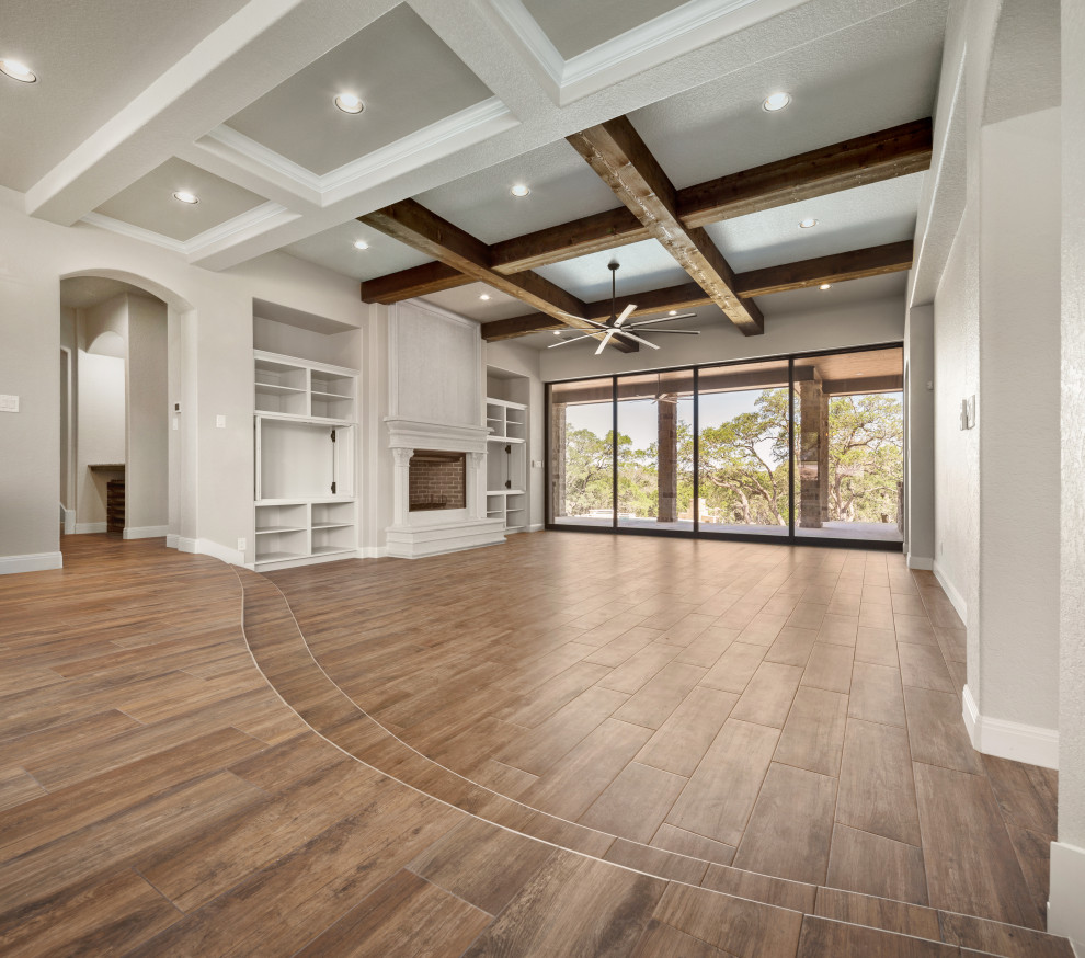 Example of a transitional home design design in Austin