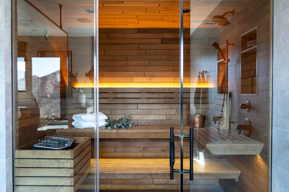 Foto di un'ampia sauna design con doccia aperta e doccia aperta