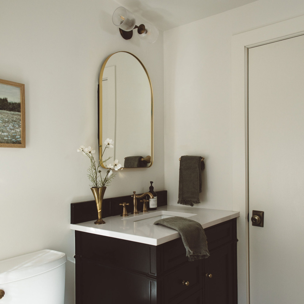 Example of a classic powder room design in Denver