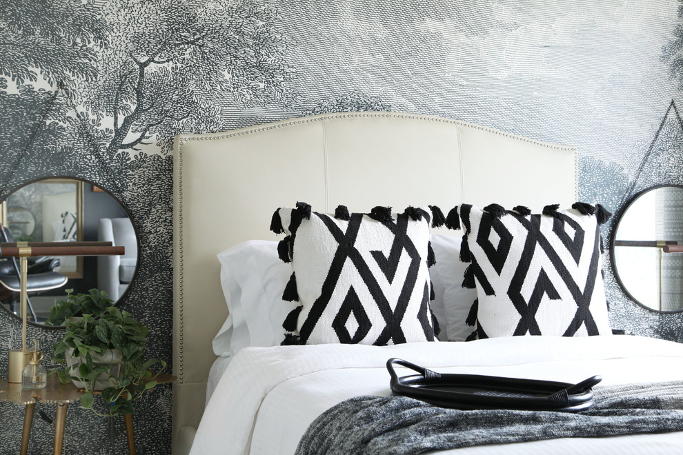 Example of a transitional bedroom design in Austin