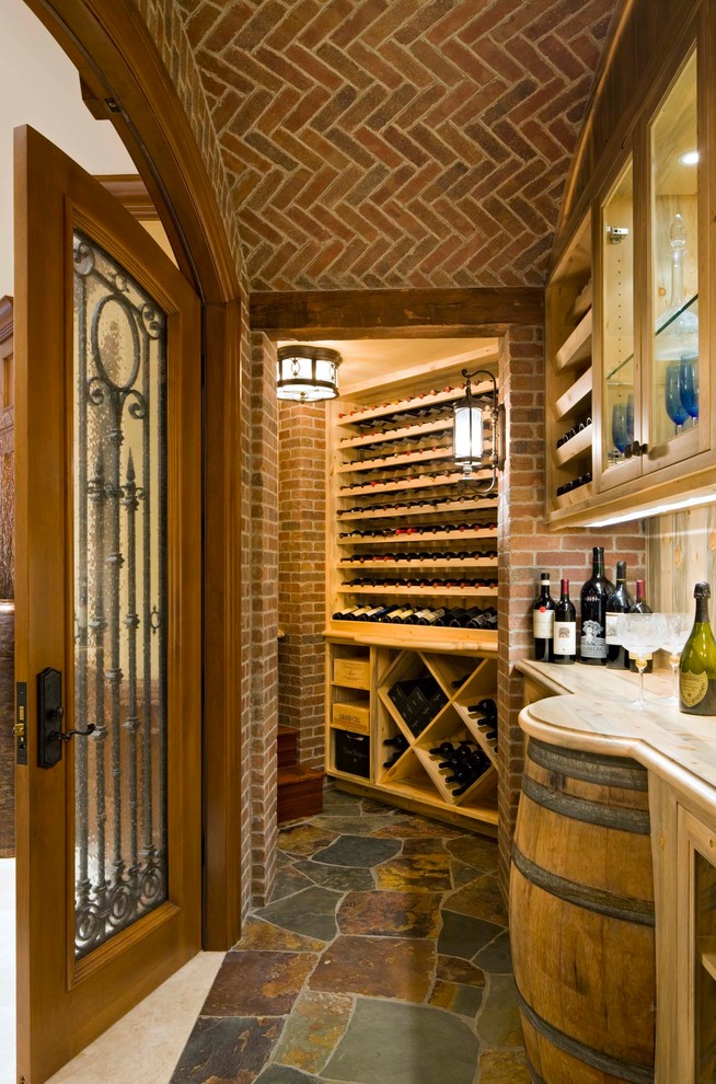 Photo of a mediterranean wine cellar in Denver with diamond bins.