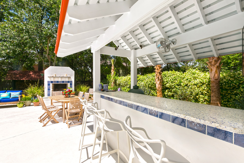 Mid-sized beach style backyard patio in Charleston with an outdoor kitchen, concrete pavers and a gazebo/cabana.
