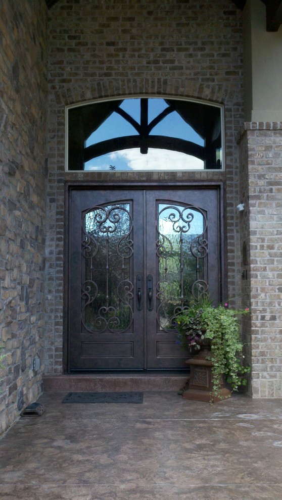 This is an example of a small traditional front door in Other with a metal front door and a double front door.