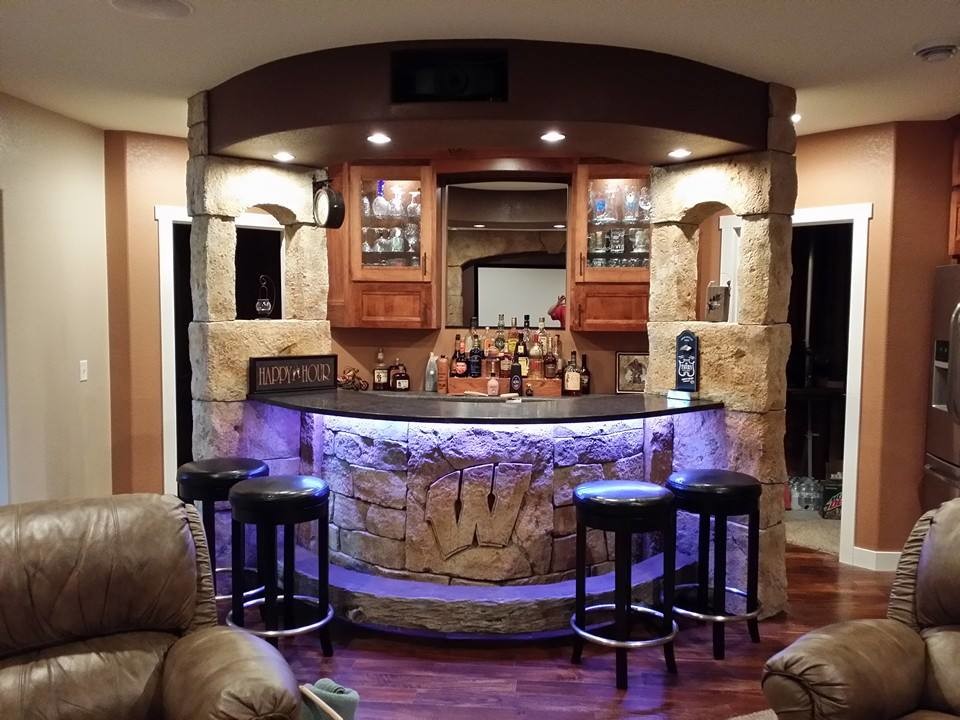 Photo of a transitional home bar in Other.