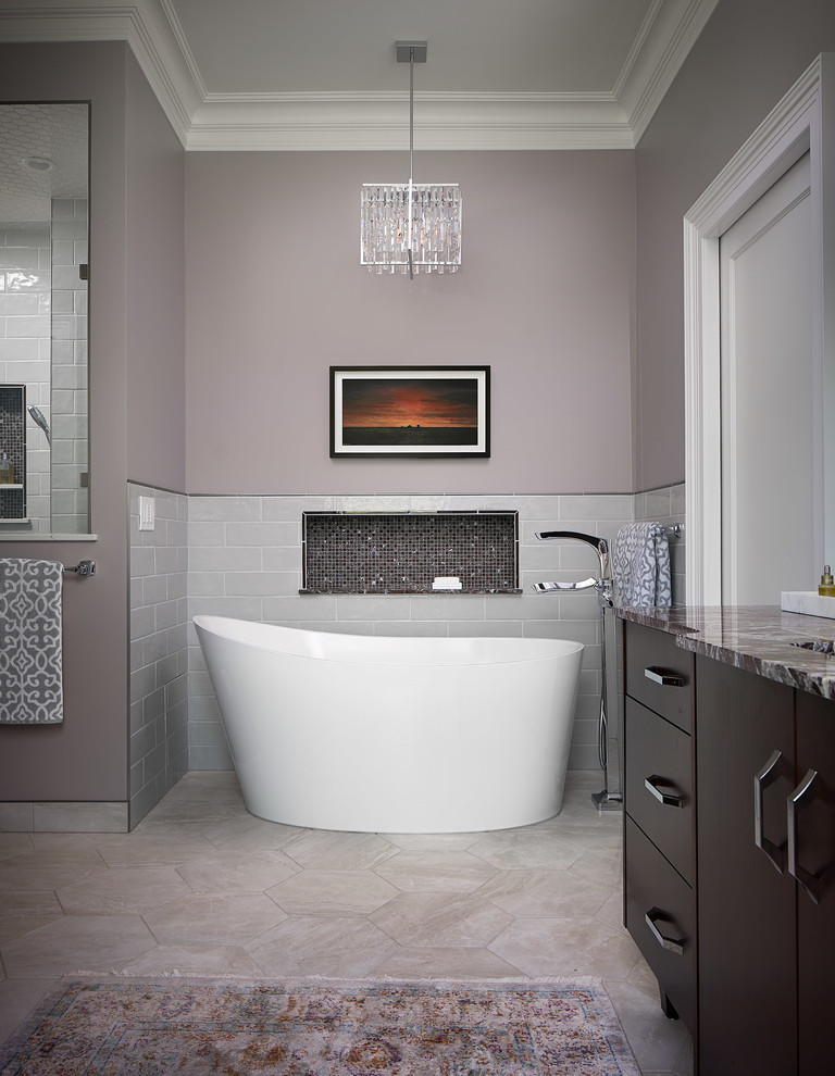 This is an example of a large transitional master bathroom in Other with flat-panel cabinets, medium wood cabinets, a freestanding tub, a double shower, a two-piece toilet, gray tile, ceramic tile, grey walls, porcelain floors, an undermount sink, marble benchtops, grey floor, a hinged shower door and red benchtops.