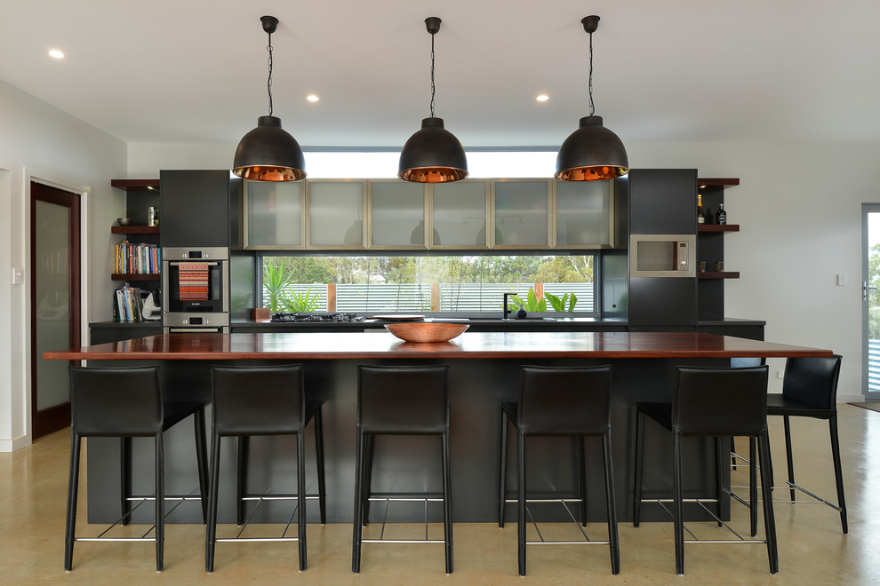 This is an example of a contemporary kitchen in Adelaide.