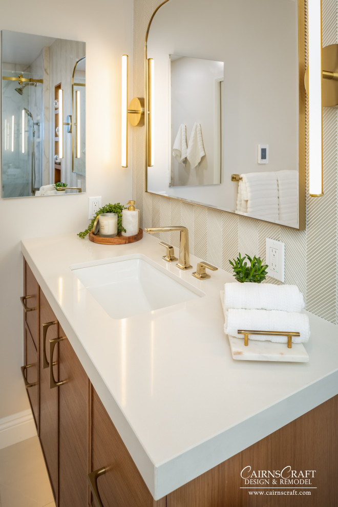 This is an example of a mid-sized contemporary master bathroom in San Diego with flat-panel cabinets, medium wood cabinets, an alcove shower, a two-piece toilet, multi-coloured tile, glass sheet wall, multi-coloured walls, porcelain floors, an integrated sink, engineered quartz benchtops, white floor, a sliding shower screen, white benchtops, a niche, a single vanity and a floating vanity.