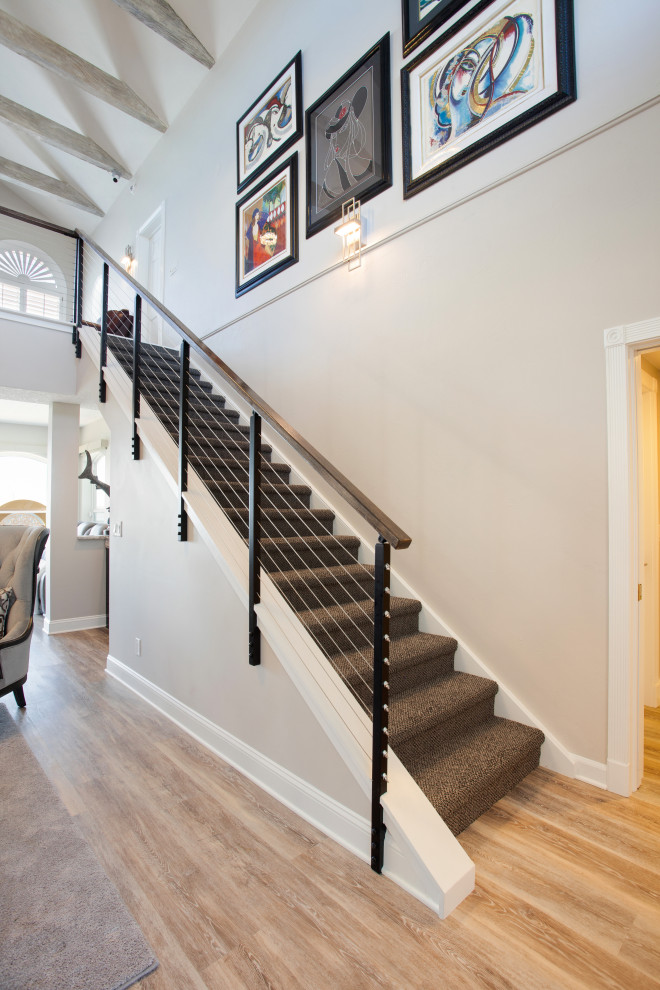Design ideas for a medium sized traditional carpeted straight mixed railing staircase in Jacksonville with carpeted risers.