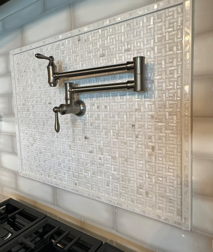 Kitchen - transitional kitchen idea in Orlando with white backsplash