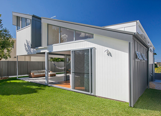 This is an example of a small contemporary two-storey exterior in Sunshine Coast.