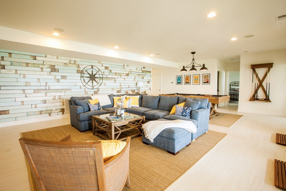 Inspiration for a large beach style walk-out basement in Other with white walls and ceramic floors.