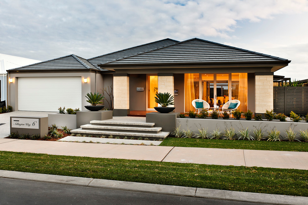 Mid-sized contemporary front yard full sun driveway in Perth with concrete pavers for summer.