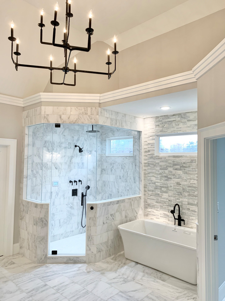 Large traditional master bathroom in Atlanta with beaded inset cabinets, white cabinets, a freestanding tub, a corner shower, a two-piece toilet, white tile, marble, grey walls, marble floors, an undermount sink, marble benchtops, white floor, a hinged shower door, grey benchtops, a shower seat, a double vanity, a built-in vanity, timber and planked wall panelling.