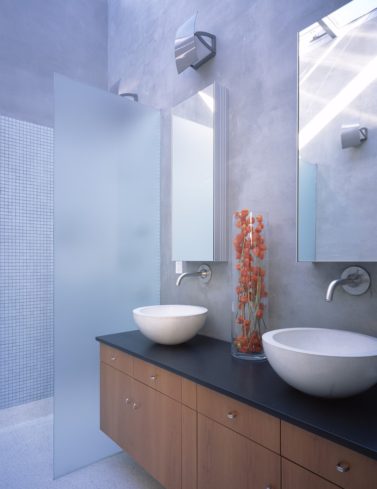 Modern bathroom in San Francisco with mosaic tile, a vessel sink and a curbless shower.