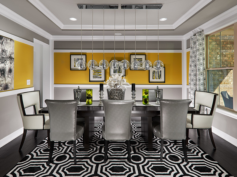 This is an example of a contemporary dining room in Raleigh.
