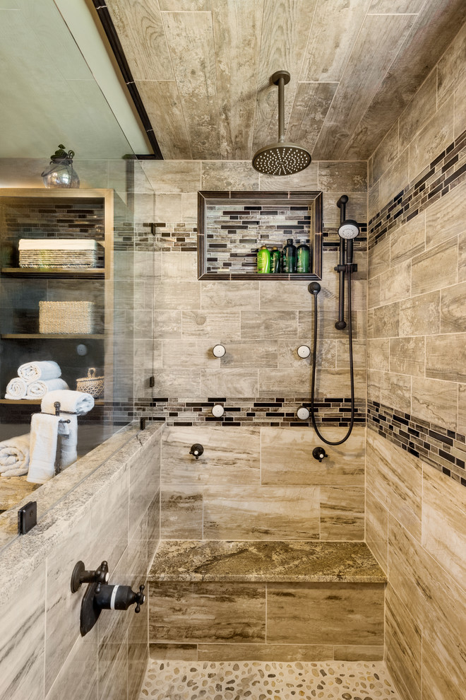 Large country master bathroom in Providence with raised-panel cabinets, dark wood cabinets, an open shower, a two-piece toilet, beige tile, porcelain tile, green walls, porcelain floors, a trough sink and granite benchtops.