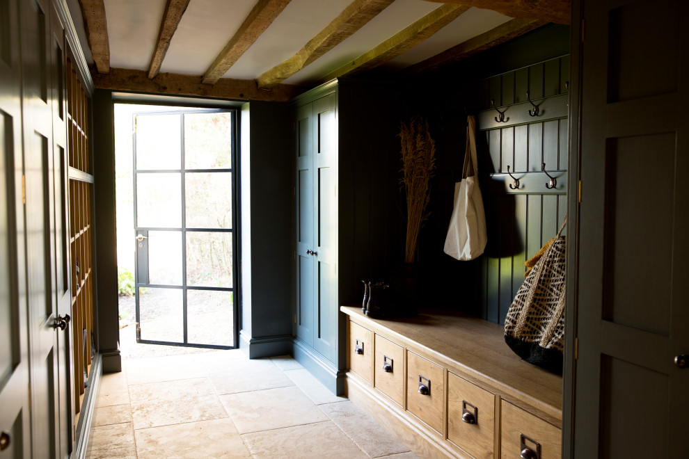 Design ideas for a small traditional cloakroom in Surrey with beaded cabinets and blue cabinets.
