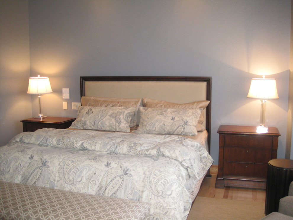 Inspiration for a large transitional master bedroom remodel with brown walls