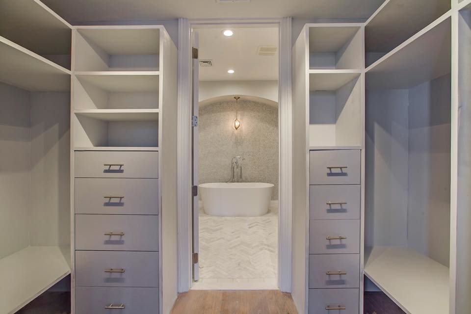 Inspiration for a mid-sized transitional gender-neutral medium tone wood floor and brown floor home design remodel in New York with shaker cabinets and white cabinets