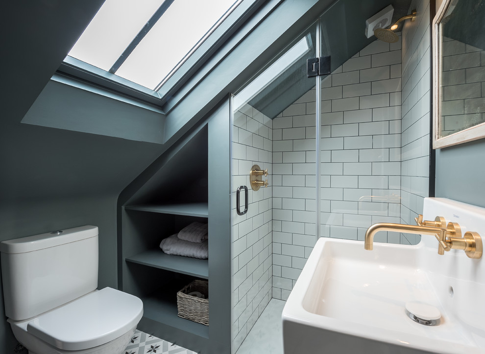 Inspiration for a small contemporary bathroom in London with an open shower, a one-piece toilet, grey walls, ceramic floors, a wall-mount sink and a hinged shower door.