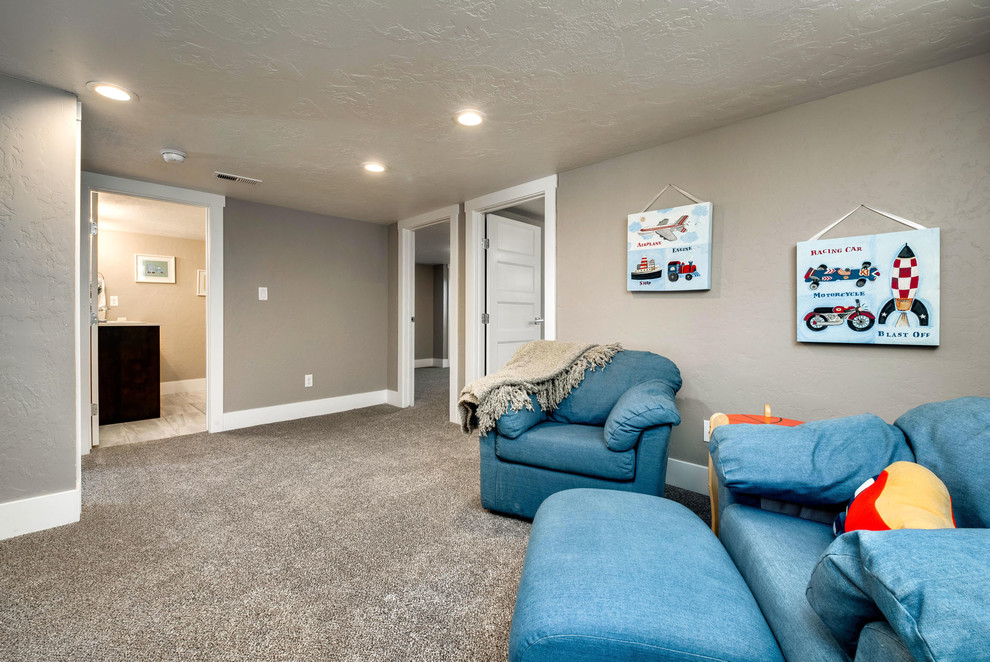 Design ideas for a small arts and crafts fully buried basement in Boise with grey walls, carpet and no fireplace.