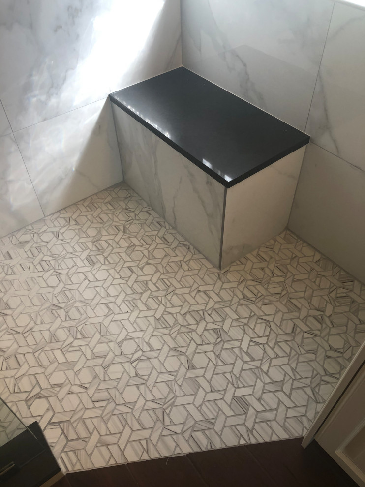 Inspiration for a transitional porcelain tile walk-in shower remodel in Austin