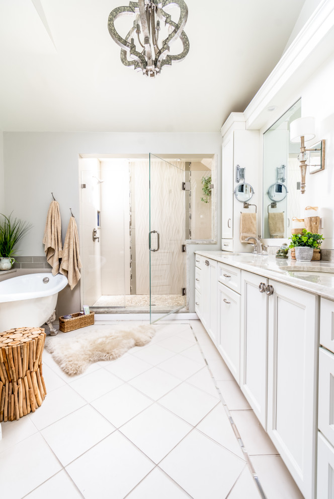 This is an example of a large transitional master bathroom in Philadelphia with shaker cabinets, white cabinets, a claw-foot tub, an alcove shower, a two-piece toilet, green tile, ceramic tile, grey walls, cement tiles, an undermount sink, granite benchtops, beige floor, a hinged shower door, green benchtops, a shower seat, a double vanity, a built-in vanity and vaulted.