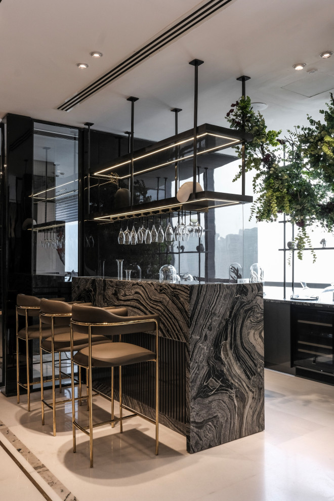 Photo of a contemporary home bar in Delhi.