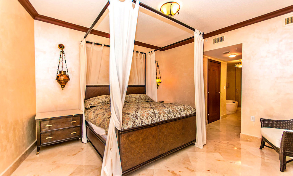 This is an example of a contemporary bedroom in Miami.