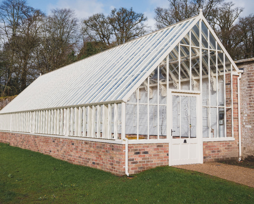 Photo of a large victorian attached greenhouse in Other.