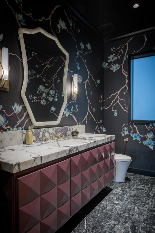 Inspiration for a mediterranean gray floor and wallpaper powder room remodel in Austin with multicolored walls, an undermount sink, white countertops and a floating vanity