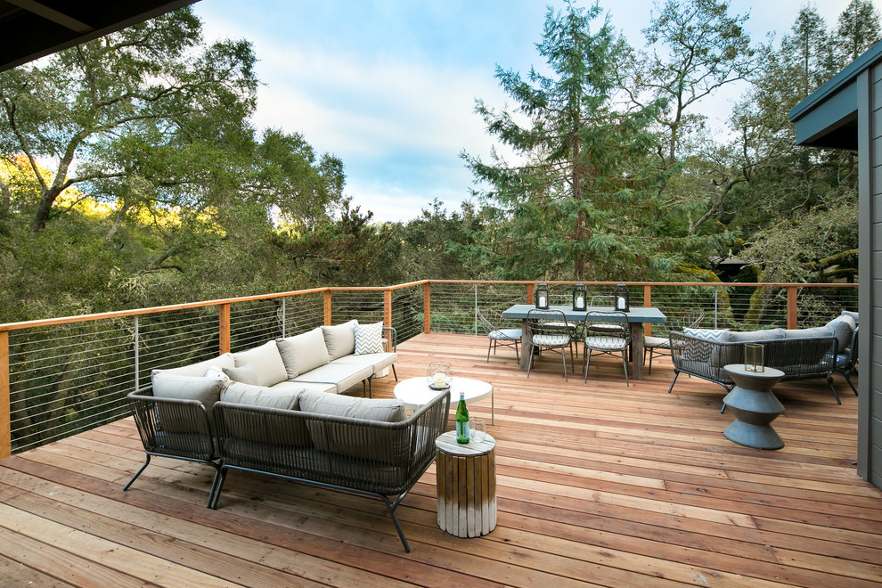 Photo of a large midcentury deck in San Francisco with no cover.