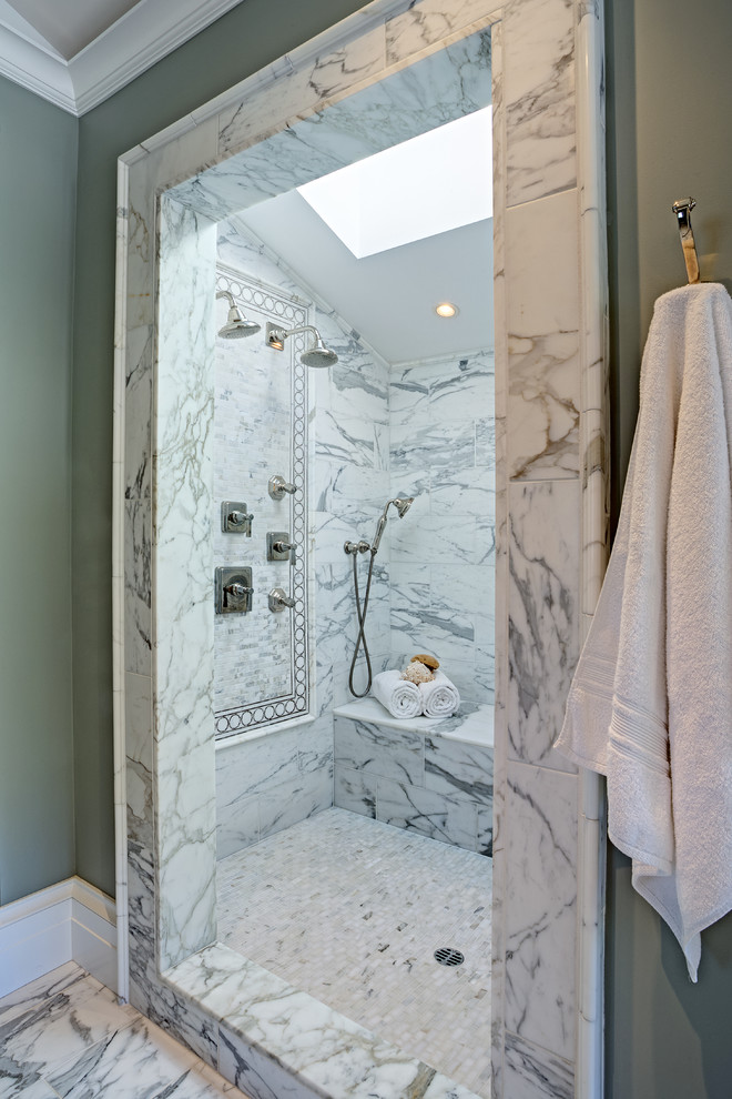 Inspiration for a mid-sized traditional master bathroom in San Francisco with an alcove shower, white tile, green walls, raised-panel cabinets, white cabinets, a one-piece toilet, marble floors, a drop-in sink and a shower seat.