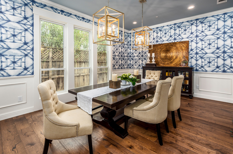 Design ideas for a traditional separate dining room in Sacramento with blue walls and dark hardwood floors.