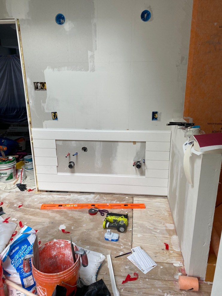 Uneven outlets on shiplap behind vanity