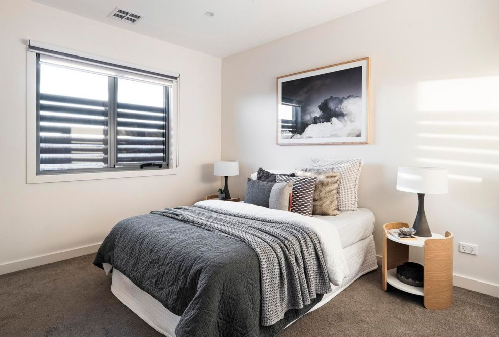 This is an example of a modern bedroom in Melbourne.