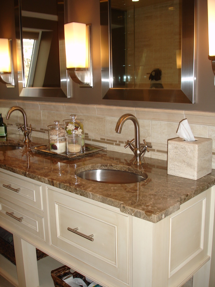 Inspiration for a mid-sized transitional master bathroom in Boston with an undermount sink, beige cabinets, marble benchtops, beige tile, ceramic tile, ceramic floors, beaded inset cabinets and brown benchtops.