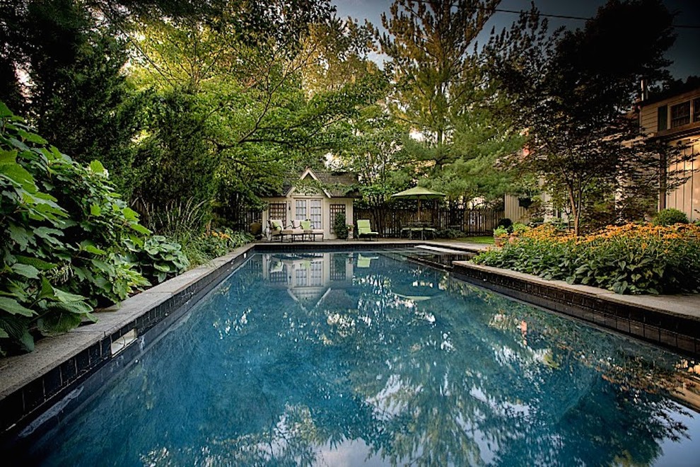Inspiration for a large transitional backyard stone and l-shaped natural pool house remodel in Toronto