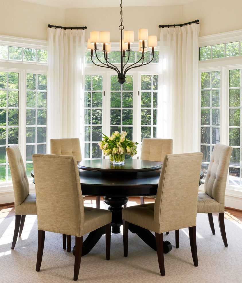 Design ideas for a transitional dining room in DC Metro with beige walls and beige floor.