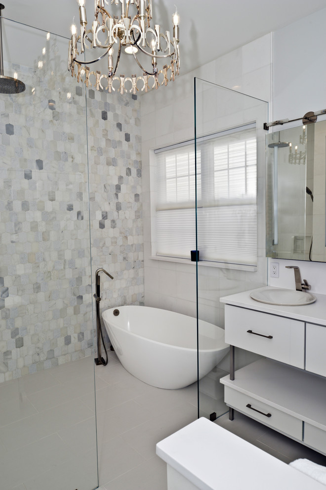 Mid-sized modern master wet room bathroom in DC Metro with flat-panel cabinets, white cabinets, a freestanding tub, black and white tile, beige walls, an integrated sink, engineered quartz benchtops, white floor, an open shower and white benchtops.