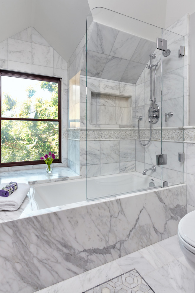 Mid-sized traditional master bathroom in San Francisco with marble, marble floors, an undermount tub, a shower/bathtub combo, white tile, white floor, a hinged shower door, grey walls and marble benchtops.