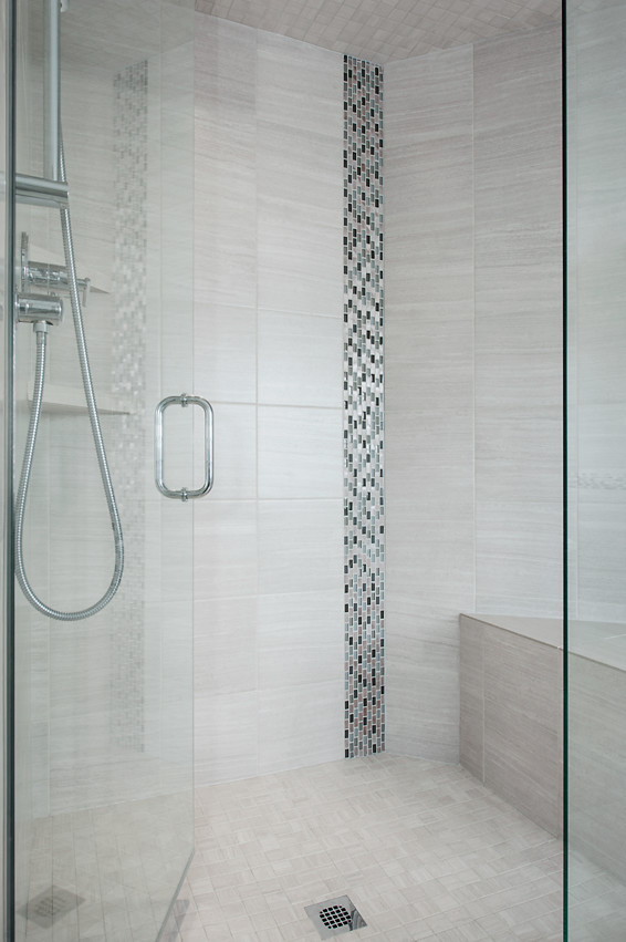 Large transitional master gray tile and porcelain tile porcelain tile freestanding bathtub photo in Calgary with an undermount sink, granite countertops, dark wood cabinets and beige walls